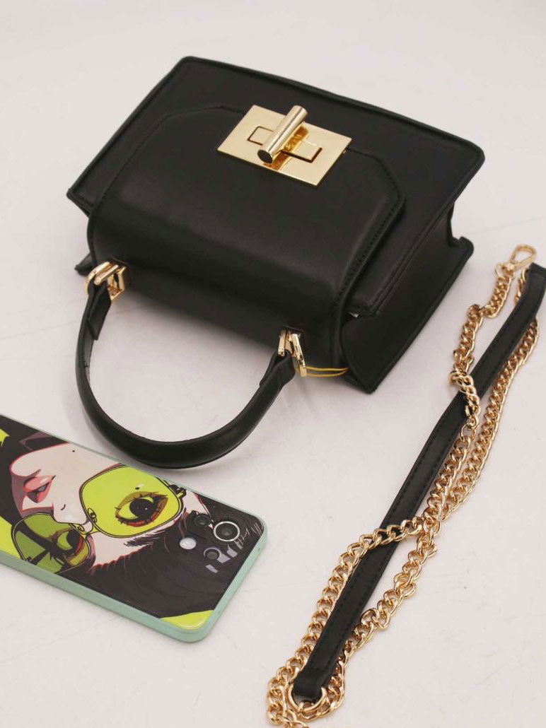 Clara - Liten handväska med guldspänne